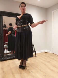 Agent Ida in character as the Disciplinarian